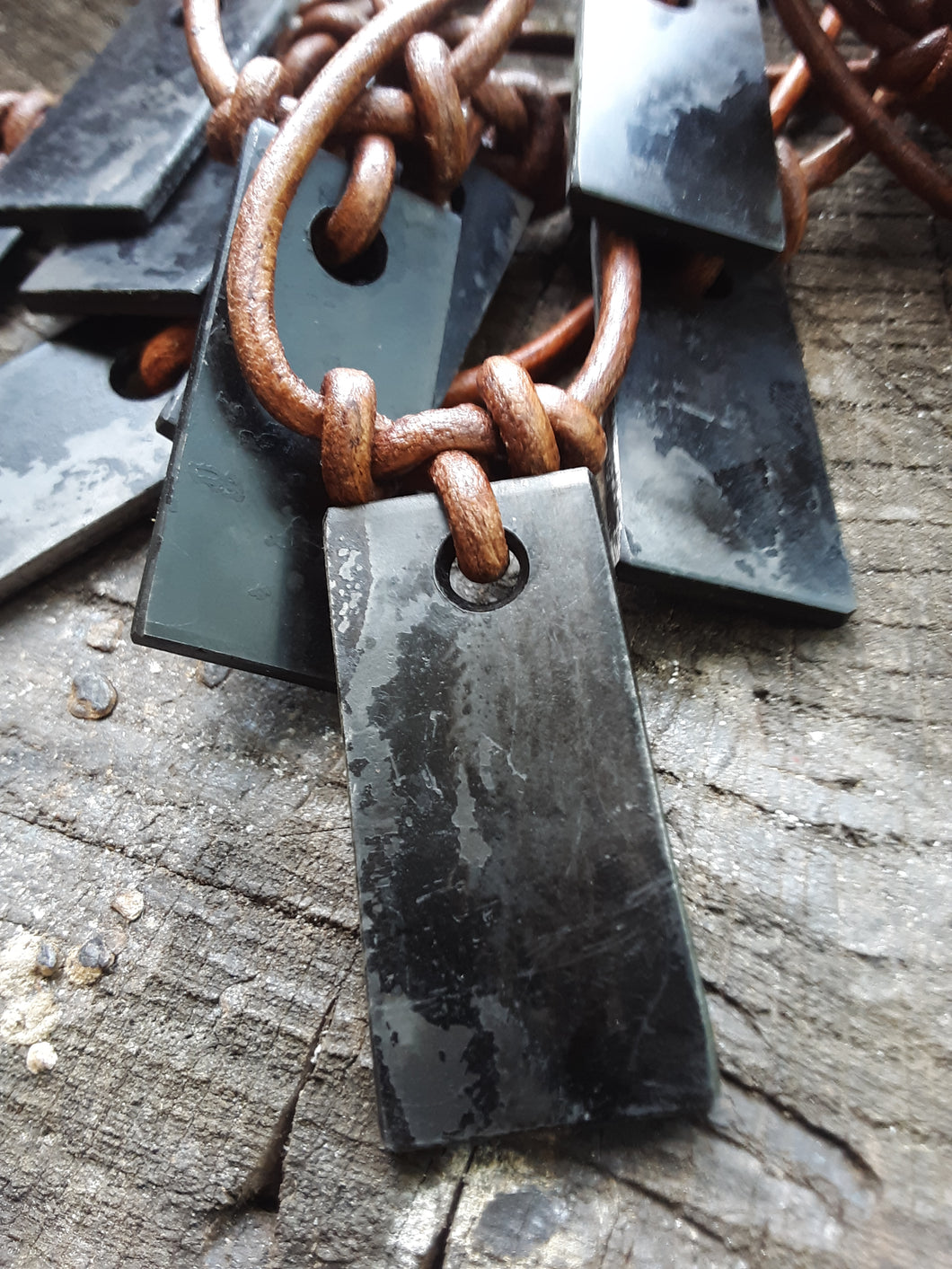 Steel striker pendant necklace